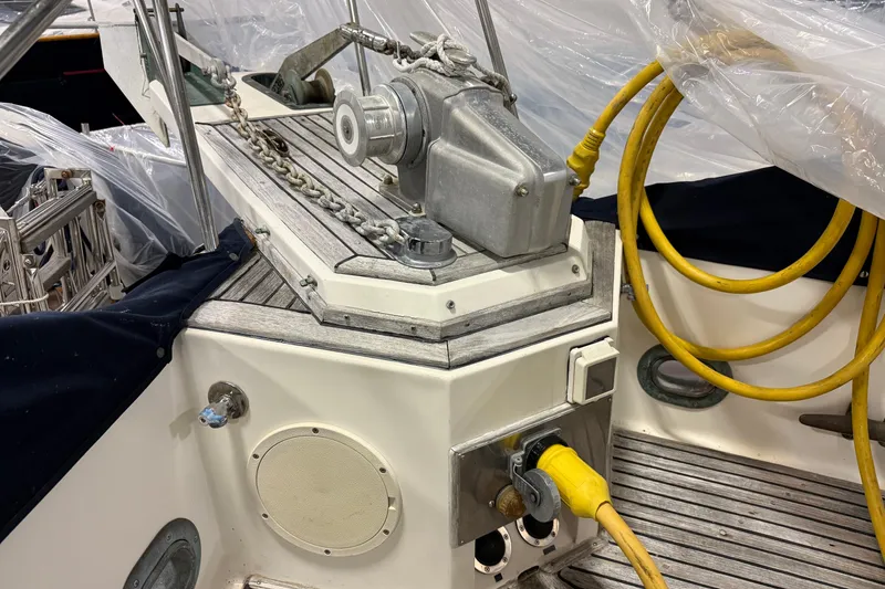 Slide: The Image of 1991 Grand Banks 42 Classic yacht deck with winch and power connections. - 121