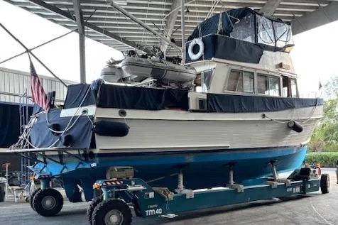 Slide: The Image of 1991 Grand Banks 42 Classic yacht on trailer in covered storage area. - 123