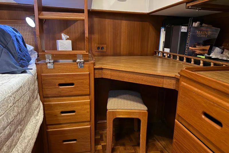 Slide: The Image of Cozy wooden cabin interior of 1991 Grand Banks 42 Classic with desk and storage. - 55