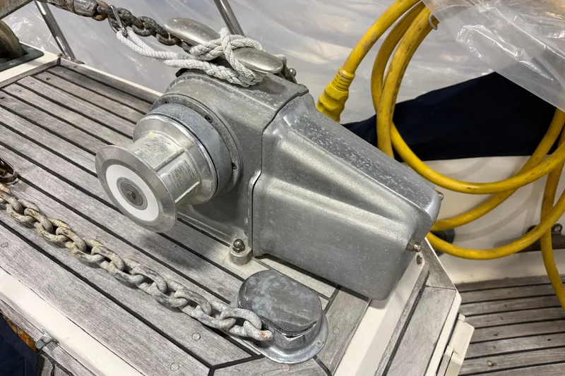 Slide: The Image of Anchor windlass on 1991 Grand Banks 42 Classic boat deck. - 122