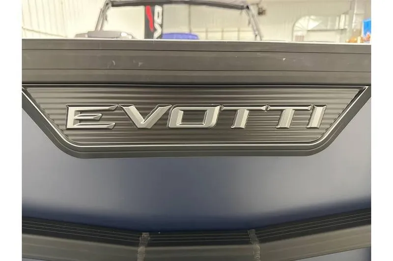 Slide: The Image of Close-up of 2026 Evotti 521CS logo on vehicle exterior. - 10