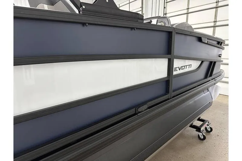 Slide: The Image of Evotti 521CS boat from 2026 in a garage. - 13