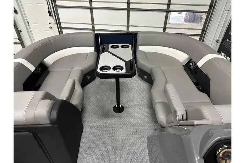 Slide: The Image of Luxurious interior of 2026 Evotti 521CS boat with plush seating and modern table design. - 28