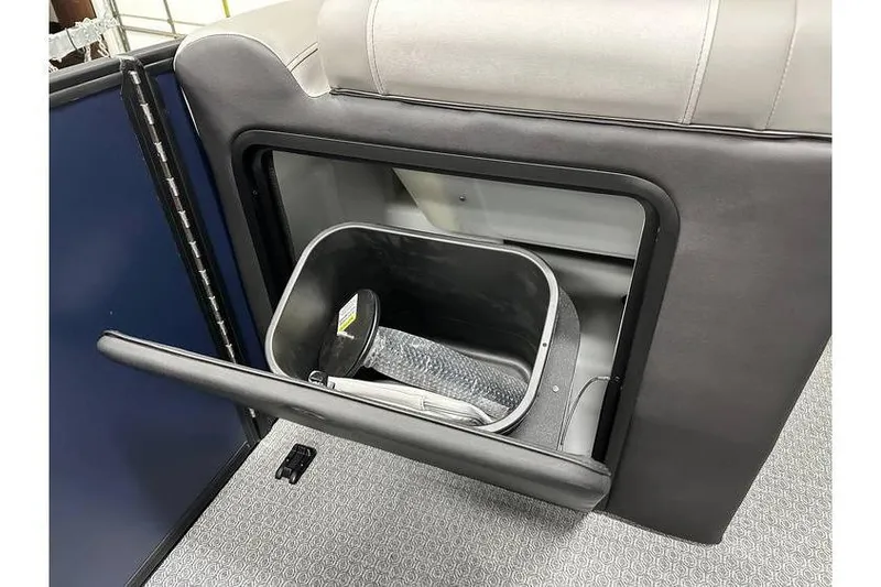 Slide: The Image of Evotti 521CS 2026 model with built-in storage compartment and trash bin. - 30