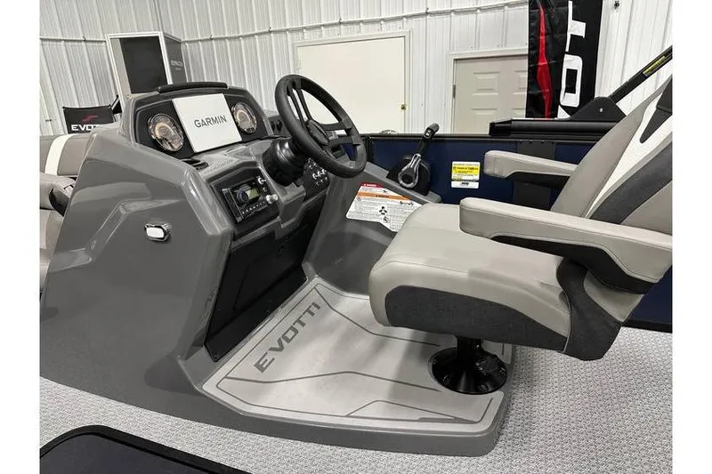 Slide: The Image of 2026 Evotti 521CS boat cockpit with Garmin navigation system and comfortable seating. - 31
