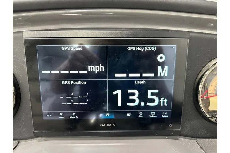 Slide: The Image of Dashboard display of a 2026 Evotti 521CS showing GPS data and depth at 13.5 feet. - 36