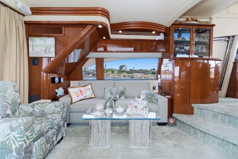 Slide: The Image of Luxurious 2005 Marquis Pilothouse yacht interior with elegant seating and decorative accents. - 23