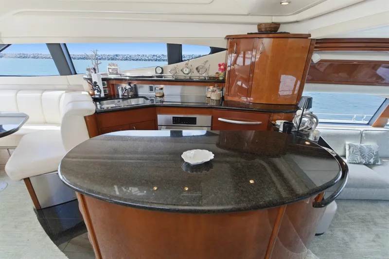 Slide: The Image of Luxurious 2005 Marquis Pilothouse yacht interior with elegant kitchen and ocean view. - 28