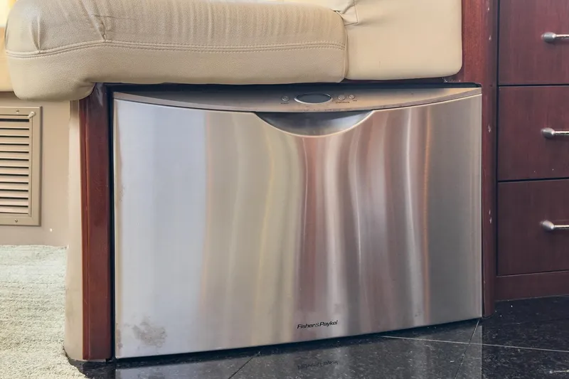 Slide: The Image of Stainless steel Fisher & Paykel dishwasher in 2005 Marquis Pilothouse yacht interior. - 34