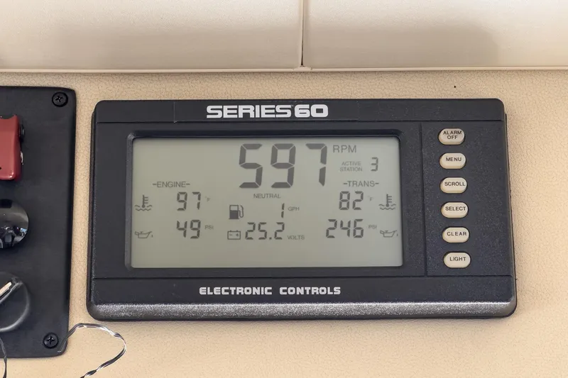Slide: The Image of Electronic control panel displaying engine data for 2005 Marquis Pilothouse yacht. - 44