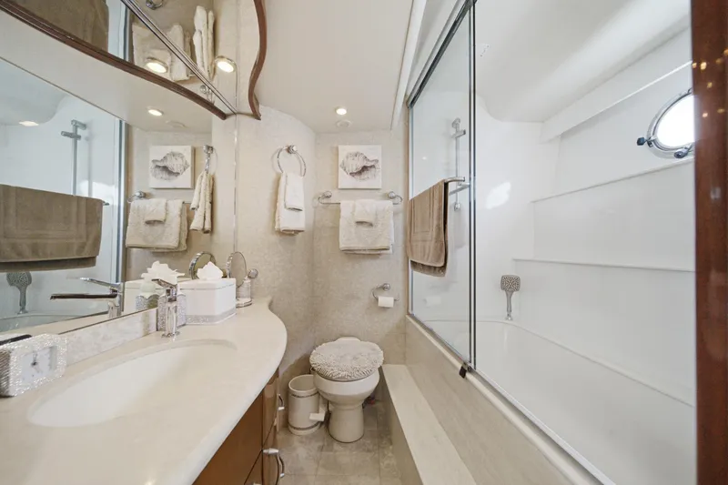 Slide: The Image of Luxurious 2005 Marquis Pilothouse yacht bathroom with elegant fixtures and modern design. - 53
