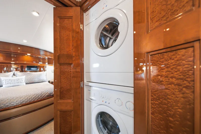 Slide: The Image of Stacked washer and dryer in 2005 Marquis Pilothouse yacht bedroom. - 55