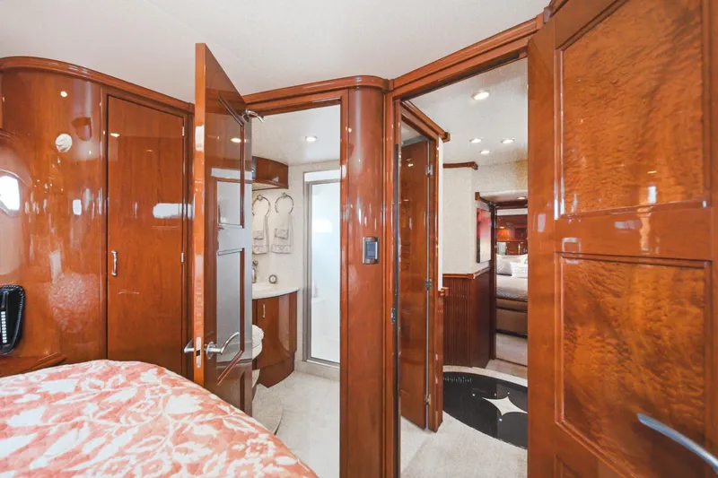 Slide: The Image of Luxurious 2005 Marquis Pilothouse interior with polished wood finishes and elegant design. - 58