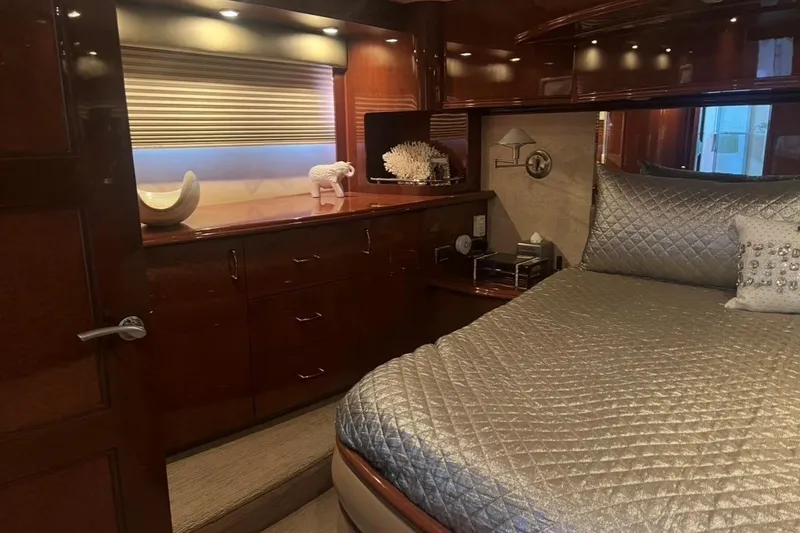 Slide: The Image of Luxurious 2005 Marquis Pilothouse bedroom with elegant decor and ambient lighting. - 6
