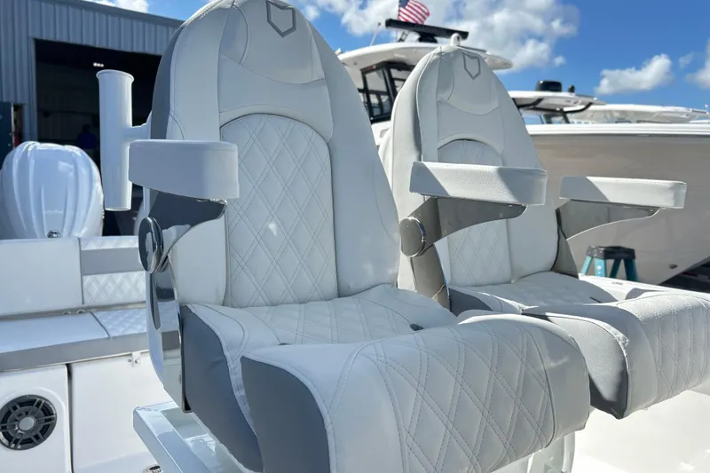 Slide: The Image of Luxurious seating on 2026 Sea Fox 268 Commander boat, featuring diamond-stitched upholstery. - 13