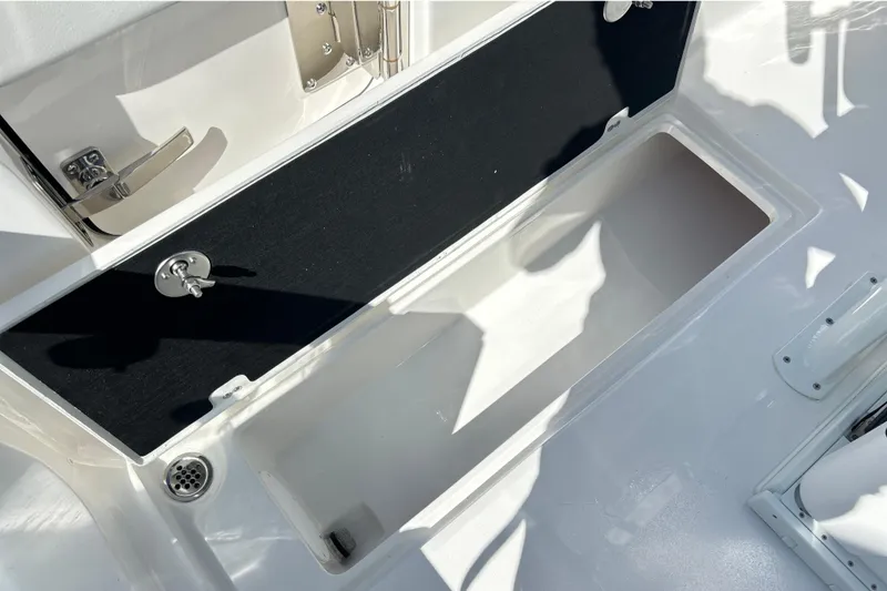 Slide: The Image of 2026 Sea Fox 268 Commander boat interior with dual seats and twin Yamaha engines. - 19