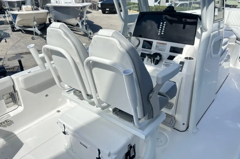 Slide: The Image of Open storage compartment on 2026 Sea Fox 268 Commander boat, featuring sleek design and durable materials. - 21