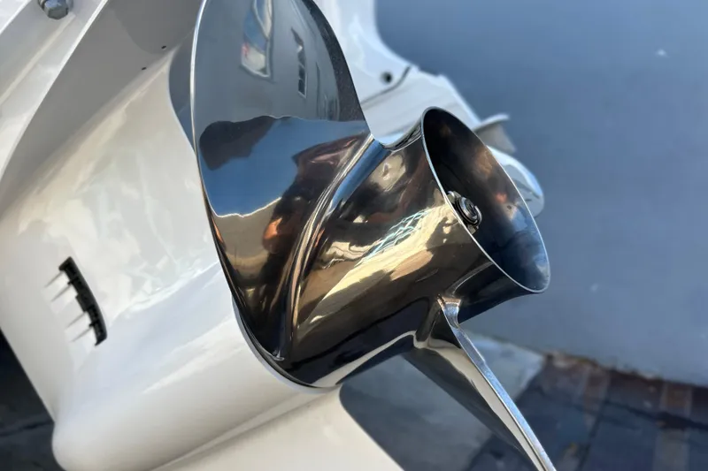 Slide: The Image of Yamaha logo on 2026 Sea Fox 268 Commander boat, reflecting blue sky and clouds. - 30