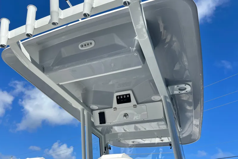 Slide: The Image of 2026 Sea Fox 268 Commander boat interior with white seating and Yeti cooler. - 5
