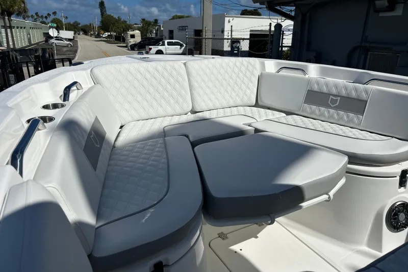 Slide: The Image of Luxurious seating area on 2026 Sea Fox 268 Commander boat, featuring quilted upholstery. - 7