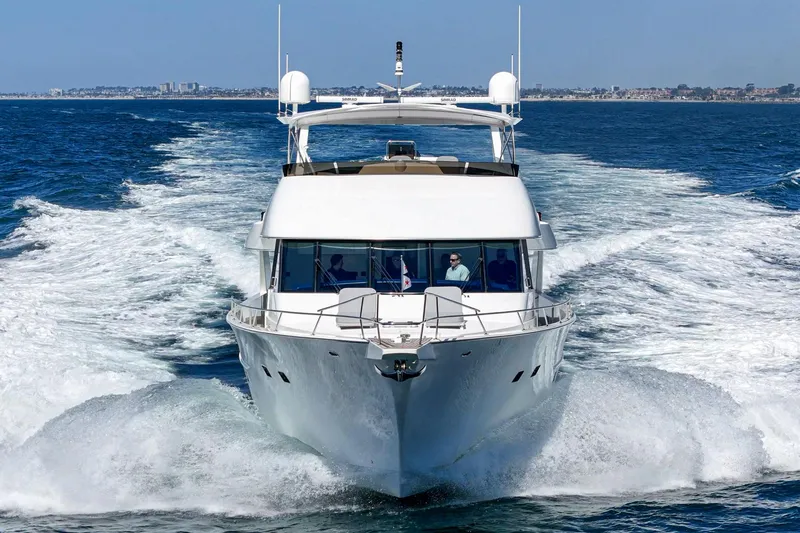 Slide: The Image of Northcoast Yachts Raised Pilothouse 1999 cruising on open water, front view. - 10