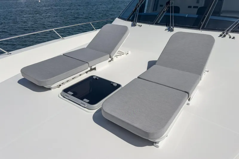 Slide: The Image of Two gray sun loungers on Northcoast Yachts Raised Pilothouse deck, 1999/2024 model. - 14