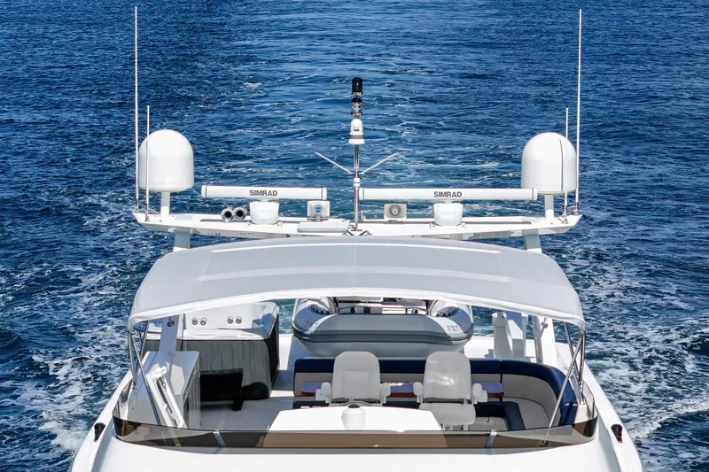 Slide: The Image of Northcoast Yachts Raised Pilothouse 1999 cruising on open water, rear view. - 18