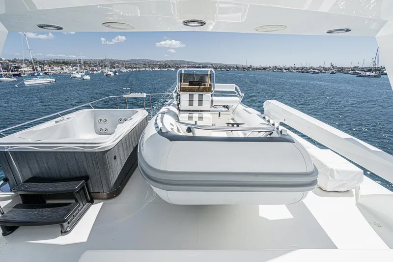 Slide: The Image of Luxurious Northcoast Yachts Raised Pilothouse 1999 with hot tub and tender on deck. - 32