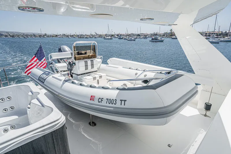 Slide: The Image of Luxury yacht deck with inflatable boat, Northcoast Yachts Raised Pilothouse 1999/2024, ocean view. - 33