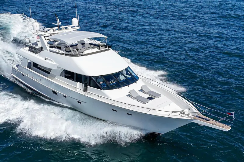 Slide: The Image of Luxurious Northcoast Yachts Raised Pilothouse cruising on open water, model 1999/2024. - 7