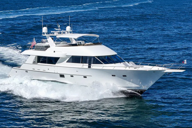 Slide: The Image of Luxurious Northcoast Yachts Raised Pilothouse cruising on open sea, 1999 model. - 9