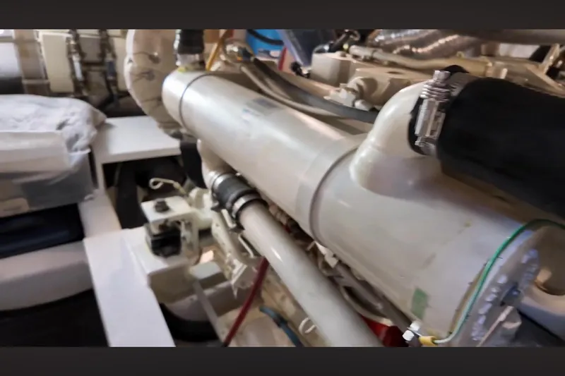 Slide: The Image of Engine room of 2002 Transpacific Marine EAGLE 53 yacht, showcasing mechanical components. - 19