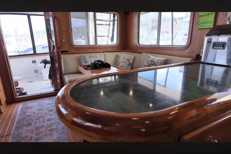 Slide: The Image of Luxurious interior of 2002 Transpacific Marine EAGLE 53 yacht with elegant wood finishes. - 5