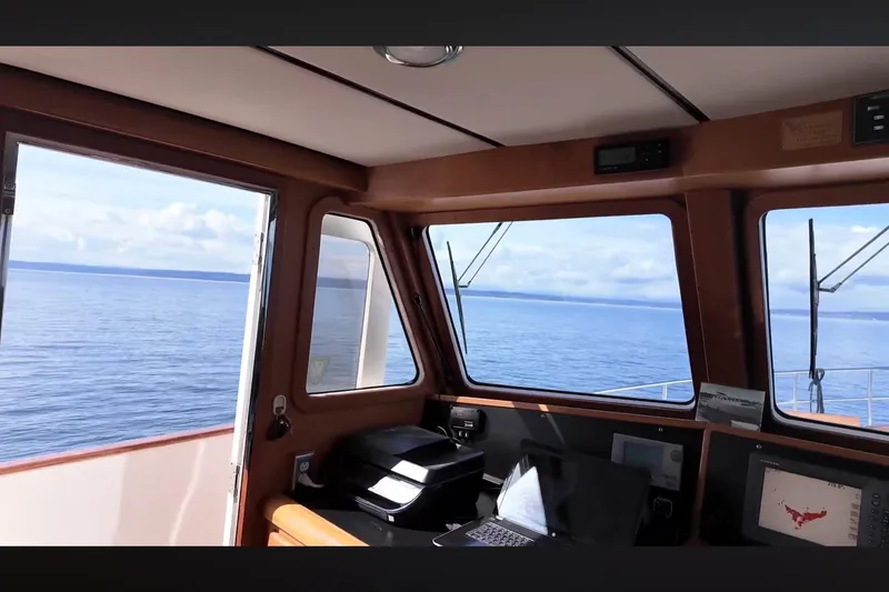 Slide: The Image of Pilothouse interior of 2002 Transpacific Marine EAGLE 53 yacht with ocean view. - 9