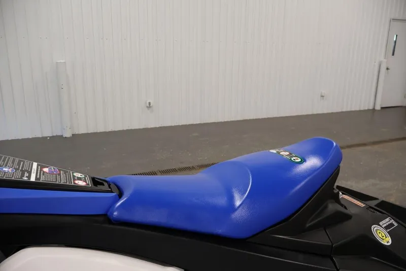 Slide: The Image of 2026 Yamaha WaveRunner JetBlaster with blue seat in a showroom setting. - 18