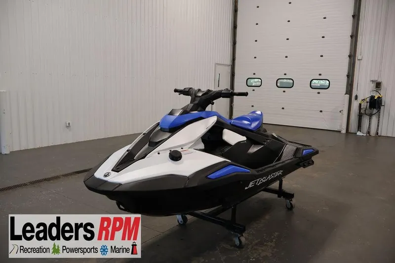 The Image of 2026 Yamaha WaveRunner JetBlaster in showroom, featuring sleek design and vibrant blue accents. - 2