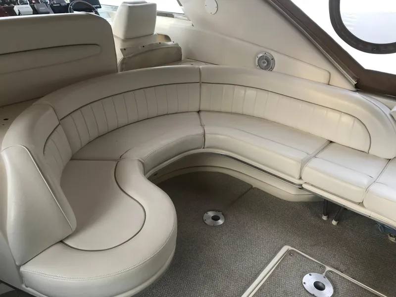 Slide: The Image of Luxurious interior seating of 1995 Sea Ray 450 Sundancer yacht. - 19