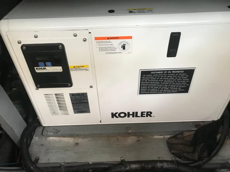 Slide: The Image of Kohler generator in 1995 Sea Ray 450 Sundancer boat engine room. - 44