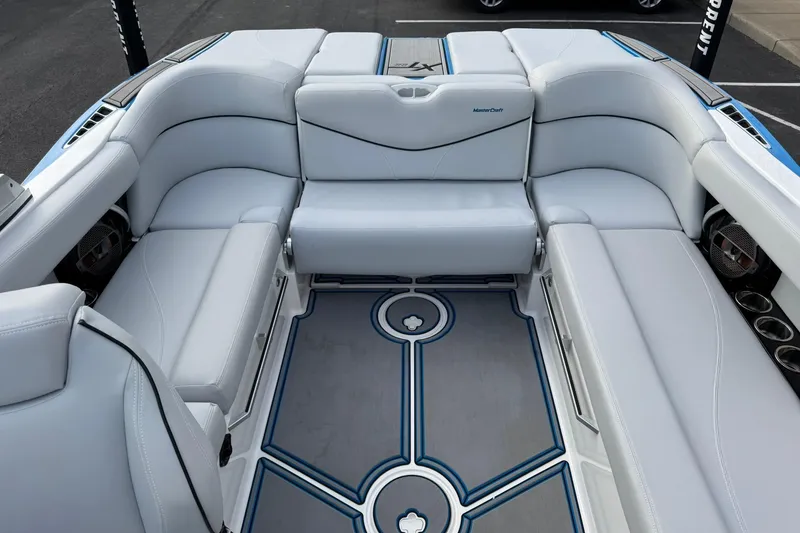 Slide: The Image of 2021 MasterCraft XT22 boat interior with luxurious seating and modern design. - 18