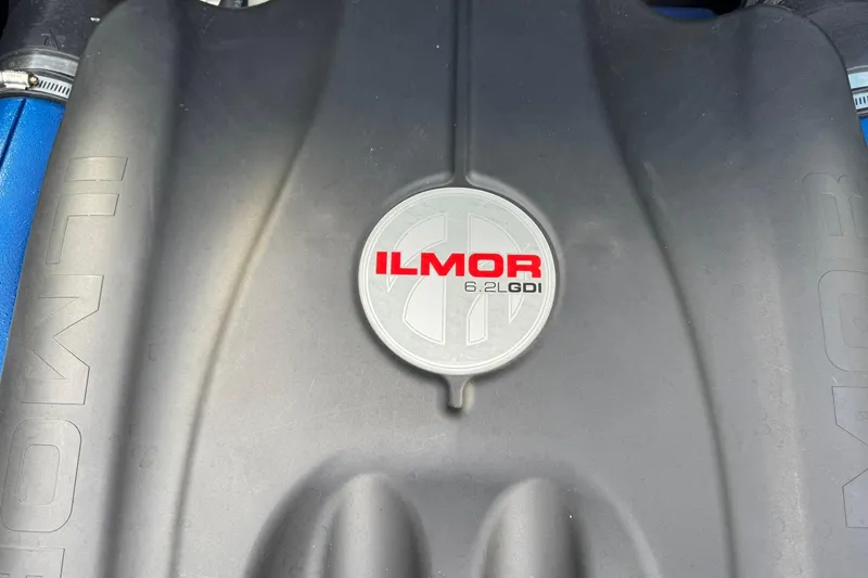 Slide: The Image of Engine cover of 2021 MasterCraft XT22 with Ilmor 6.2L GDI branding. - 21