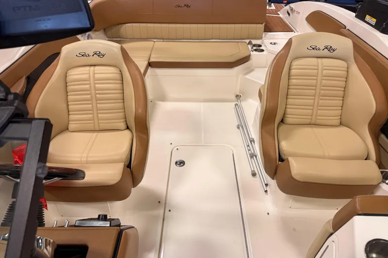 Slide: The Image of Interior of 2018 Sea Ray SPX 210 boat with beige leather seating. - 17