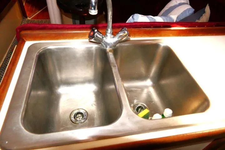Slide: The Image of Double stainless steel sink in 1989 Catalina 34 yacht kitchen. - 17