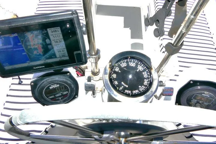 Slide: The Image of Cockpit of 1989 Catalina 34 sailboat with navigation instruments and compass. - 41
