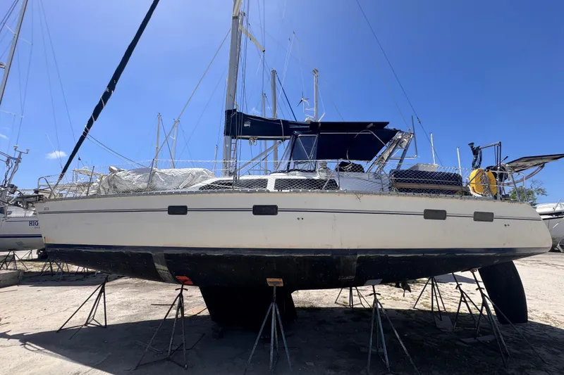 The Image of Sailboat on stands, 1992 Hunter Passage 42, under clear blue sky. - 0