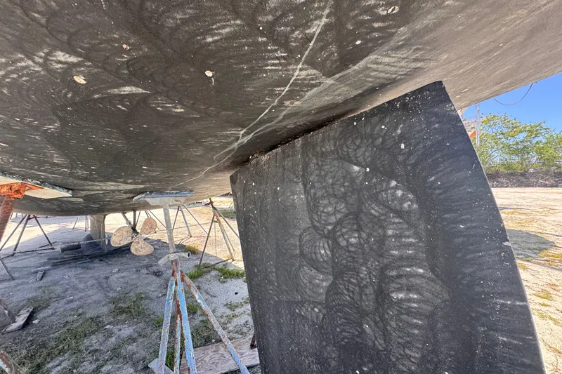 Slide: The Image of Underside view of 1992 Hunter Passage 42 sailboat on stands, showing keel and propeller. - 22