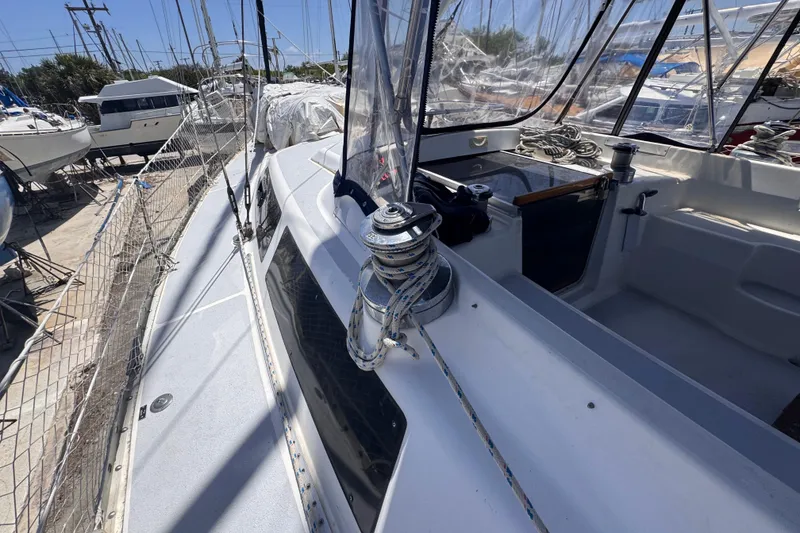 Slide: The Image of 1992 Hunter Passage 42 sailboat deck with rigging and cockpit view. - 31
