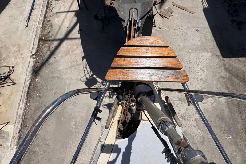 Slide: The Image of Bow view of 1992 Hunter Passage 42 sailboat with wooden platform and metal fittings. - 36