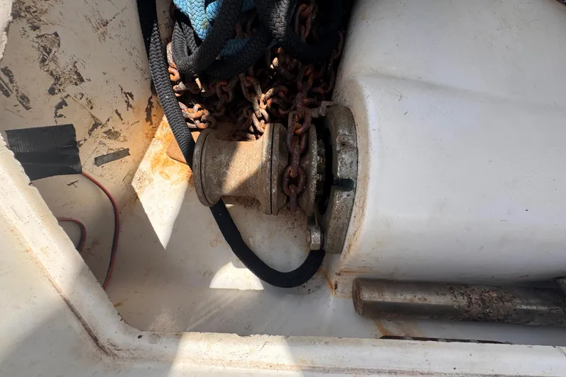 Slide: The Image of Anchor chain and ropes in a 1992 Hunter Passage 42 sailboat compartment. - 37