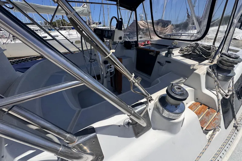 Slide: The Image of Cockpit of 1992 Hunter Passage 42 sailboat with winches and ropes. - 44