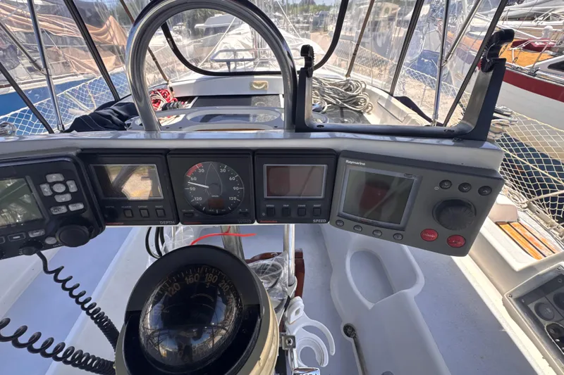 Slide: The Image of Cockpit of 1992 Hunter Passage 42 sailboat with navigation instruments and compass. - 57